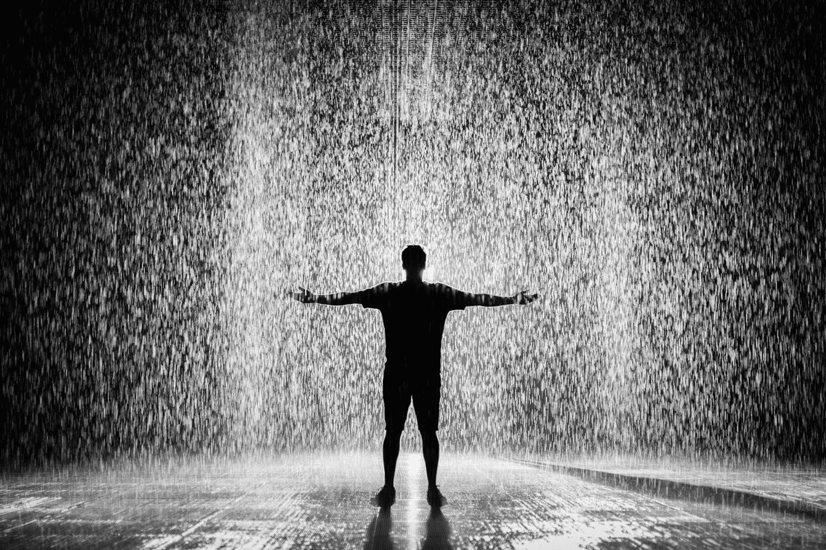 A detailed Qwen Image 3 composition showing a human figure surrounded by rain-like particles.